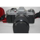 Canon AV-1 together with Sirius MC autozoom 28-70mm lens
