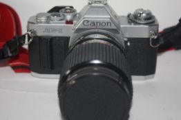 Canon AV-1 together with Sirius MC autozoom 28-70mm lens