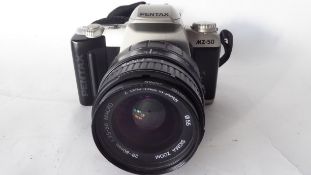 Pentax MZ-50 together with a Sigma zoom 28-80mm lens