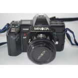 Minolta 7000 AF together with Sigma Zoom lens, bag and manual