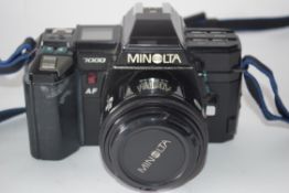 Minolta 7000 AF together with Sigma Zoom lens, bag and manual