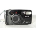 Pentax Zoom 60-X together with case and manual