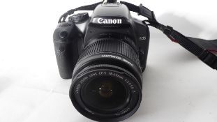 Canon EOS 450D together with a Canon EFS 18-55mm lens