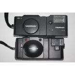 Olympus XA2 film camera together with Voigtlander Vito C film camera