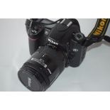 Nikon D80 together with AF Nikkor 28-85mm lens, leads and case