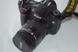 Nikon D80 together with AF Nikkor 28-85mm lens, leads and case