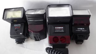 Collection of flashes to include a Cobra 700 AF-M and Minolta Program 2800 AF