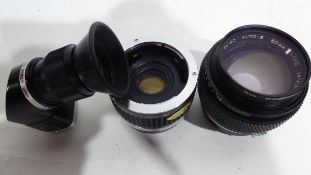 Olympus Zuiko 50mm lens together with a Tamron teleconverter and a Varimagni finder