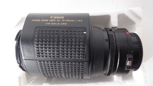 Canon zoom lens AC 75-200mm together with Tokina AF 100-300mm lens