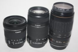 Canon EFS 55-250mm lens, together with a Canon 100-300mm lens and a Canon zoom lens EF-S10-18mm