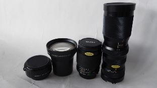 Kenlock Autozoom 85-210mm lens together with Hoya 135mm lens, Olympus teleconversion lens and a