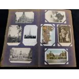 Postcard album containing approx 120 late19th/early 20th century picture postcards including