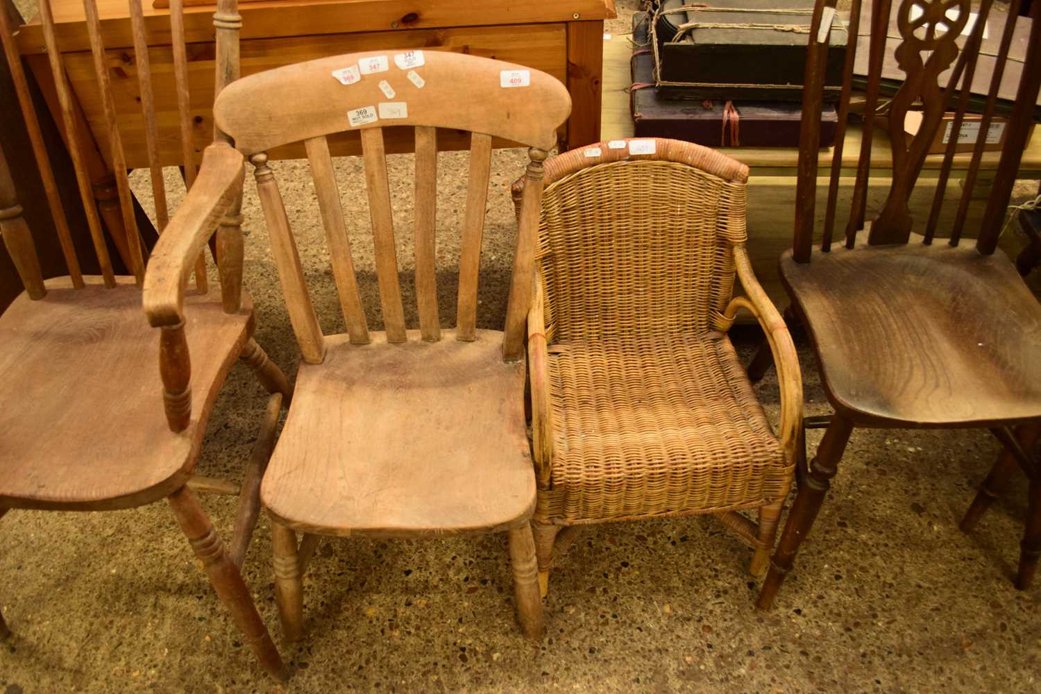 ELM SEATED KITCHEN CHAIR TOGETHER WITH A SMALL CHILD'S WICKER CHAIR (2)