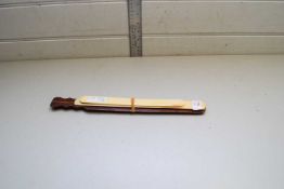 CARVED HARDWOOD PAGE TURNER TOGETHER WITH TWO SMALLER IVORY EXAMPLES