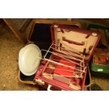 SUITCASE, A TRAVELLING PICNIC SET AND A RETRO WIRE WORK MAGAZINE RACK