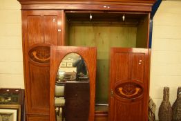 EDWARDIAN MAHOGANY AND INLAID TRIPLE DOOR WARDROBE ON A TWO-DRAWER BASE, 180CM WIDE