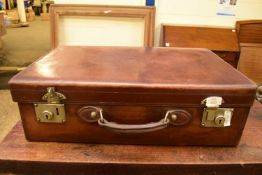 VINTAGE LEATHER SUITCASE FITTED WITH VANITY SET TO INTERIOR, 61CM WIDE