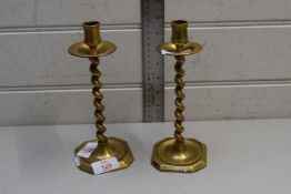 PAIR OF BRASS BARLEY TWIST STEMMED CANDLESTICKS