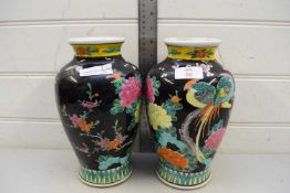 PAIR OF CHINESE FAMILLE NOIR BALUSTER VASES DECORATED WITH BIRDS