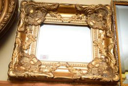 SMALL RECTANGULAR WALL MIRROR IN HEAVY FOLIATE MOULDED GILT FRAME, 42CM WIDE