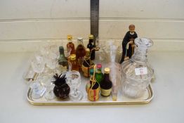 TRAY CONTAINING VARIOUS MINIATURE SPIRIT AND WHISKY BOTTLES, DECANTER, CLEAR DRINKING GLASSES AND