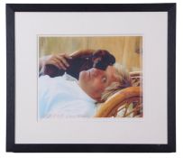 A signed photograph of David Hockney by an unknown photographer, ca. 1980s, together with a signed