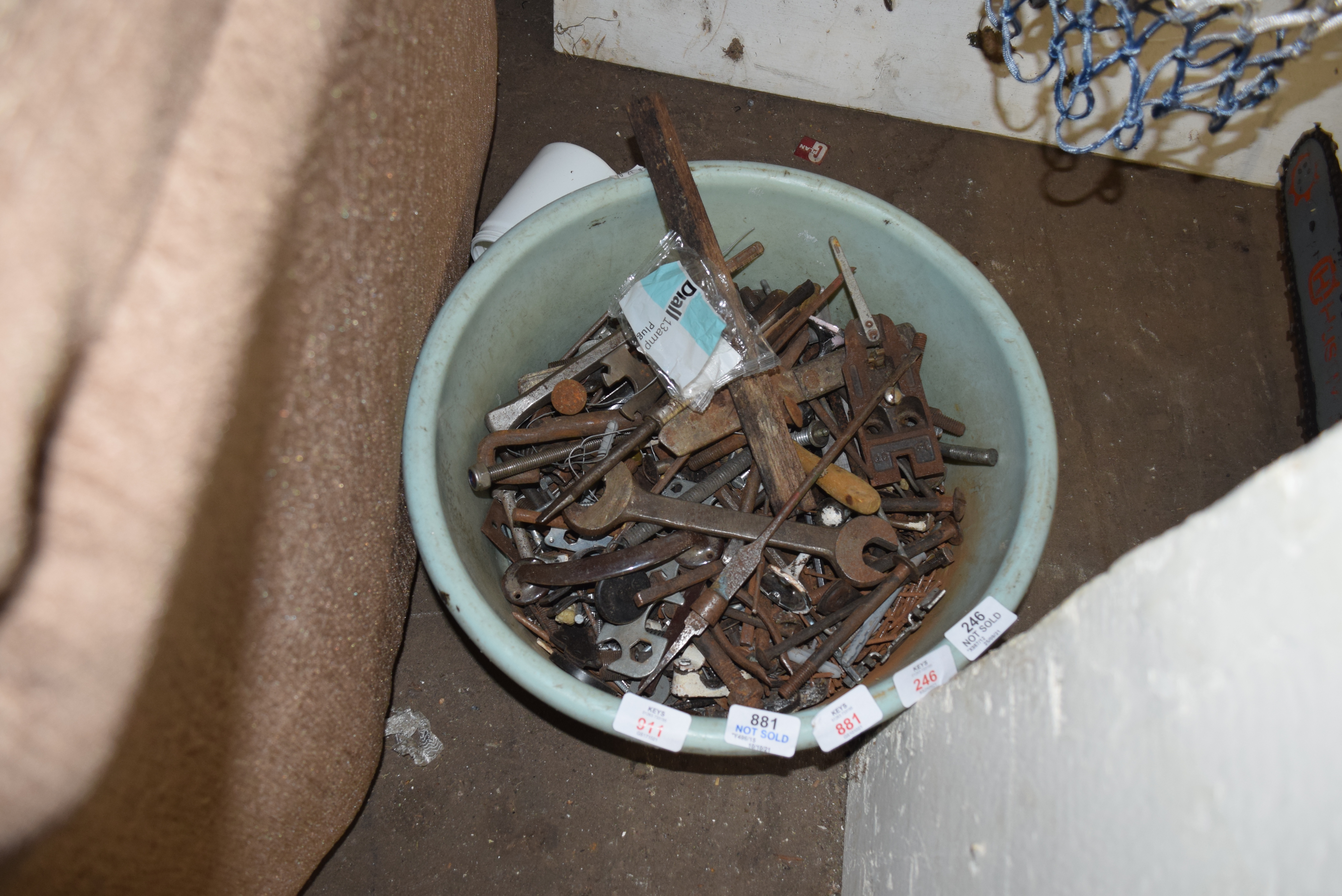 BOWL OF MIXED SPANNERS AND OTHER TOOLS