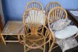 FOUR WICKER CONSERVATORY CHAIRS AND ACCOMPANYING TABLE
