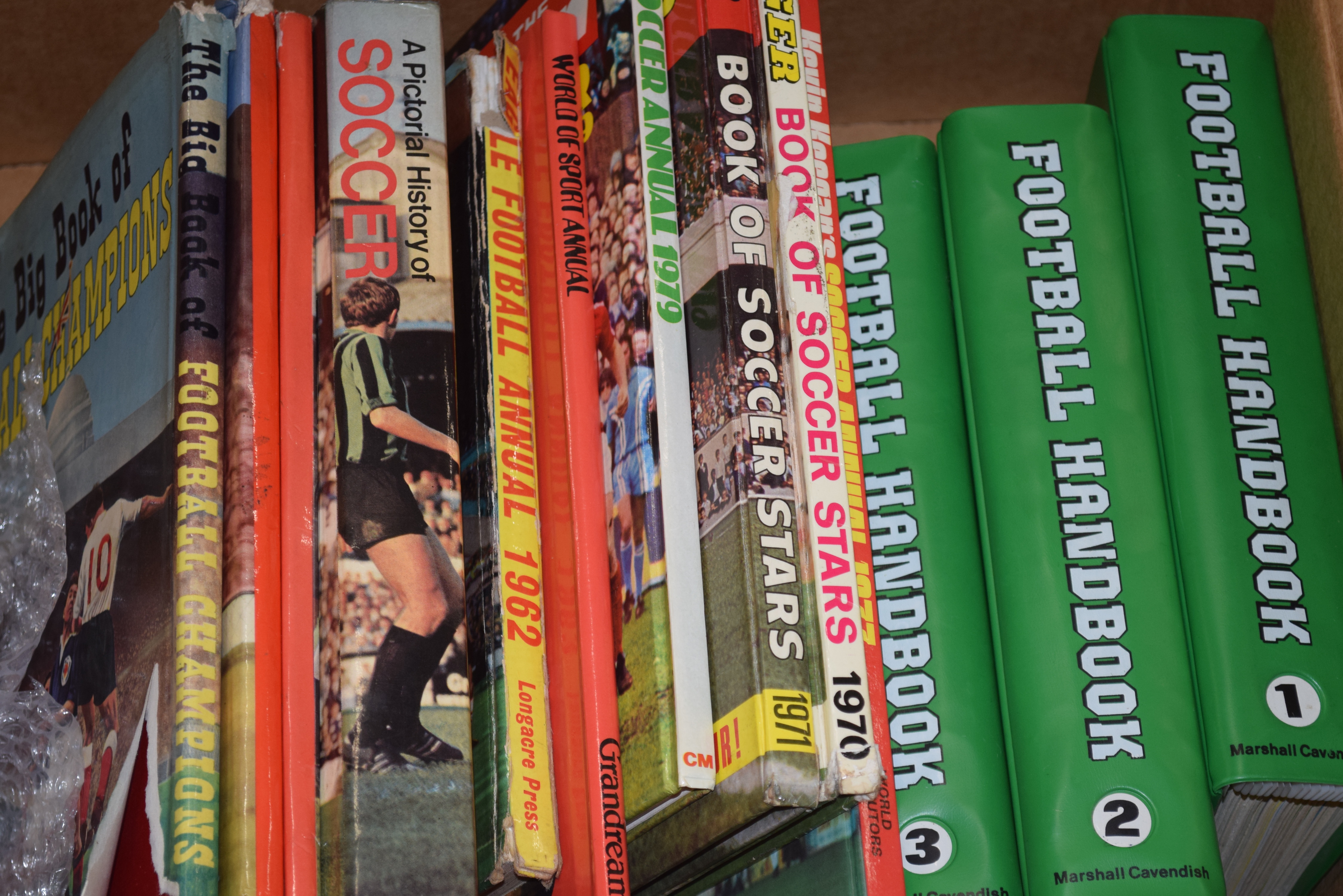 FOOTBALL INTEREST - FOOTBALL HANDBOOK IN THREE BINDERS PLUS VARIOUS ANNUALS AND OTHERS