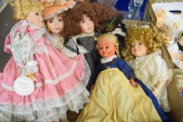 BOX OF PORCELAIN HEADED DOLLS