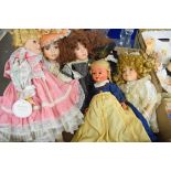 BOX OF PORCELAIN HEADED DOLLS