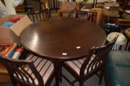 STAG MINSTREL EXTENDING DINING TABLE AND FOUR CHAIRS