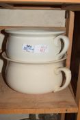 TWO CREAM GLAZED CHAMBER POTS