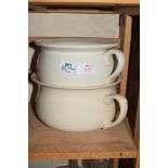 TWO CREAM GLAZED CHAMBER POTS