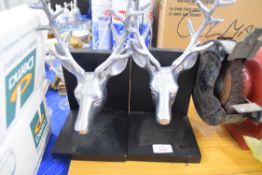 PAIR OF BOOK ENDS WITH ALUMINIUM DEER HEAD MOUNTS