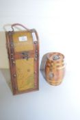 LEATHER MOUNTED BOTTLE CARRIER DECORATED WITH A MAP TOGETHER WITH A BARREL FORMED MONEY BOX