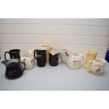 COLLECTION OF VARIOUS MODERN WADE AND OTHER WHISKY PUB JUGS TO INCLUDE BELLS, FAMOUS GROUSE, QUEEN