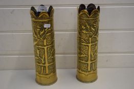 PAIR OF TRENCH ART SHELL CASES DECORATED WITH FLORAL DETAIL ON A PLANISHED BACKGROUND