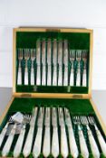 CANTEEN OF SILVER PLATED AND MOTHER OF PEARL HANDLED DESSERT CUTLERY