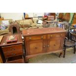 EDWARDIAN MAHOGANY TWO DOOR TWO DRAWER SIDEBOARD WITH LION HEAD RINGLET HANDLES RAISED ON CABRIOLE