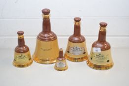 FIVE GRADUATED WADE WHISKY BELLS (EMPTY)