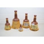 FIVE GRADUATED WADE WHISKY BELLS (EMPTY)