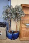 PAIR OF SIMULATED OLIVE TREES SET IN BLUE GLAZED CORNER POTS