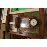 UNUSUAL VICTORIAN OAK FRAMED THREE PLATE HALL MIRROR WITH FRETWORK FRAMING AND INSET WITH AN ANEROID