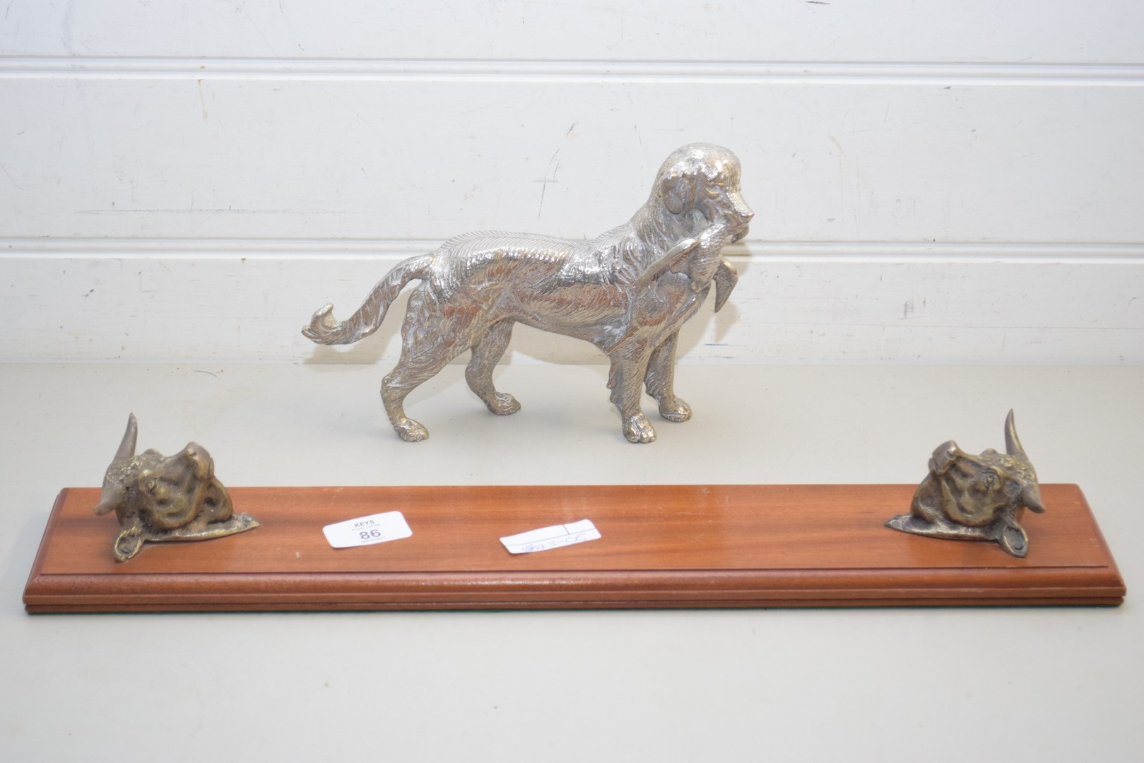 SILVER PLATED MODEL OF A DOG TOGETHER WITH A BULLS HEAD AND WOOD MOUNTED CARVING SET STAND