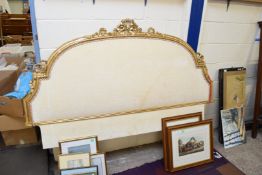 LARGE ORNATE HEADBOARD WITH GILT FRAME AND RIBBON MOUNTS AND AN UPHOLSTERED CENTRE, 186CM WIDE
