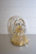 MODERN SEIKOSKELETON MANTEL CLOCK FITTED WITH QUARTZ MOVEMENT UNDER A GLASS DOME