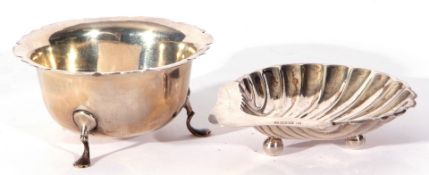 Mixed Lot comprising an Edward VII silver shell dish standing on three ball feet, Sheffield 1909,