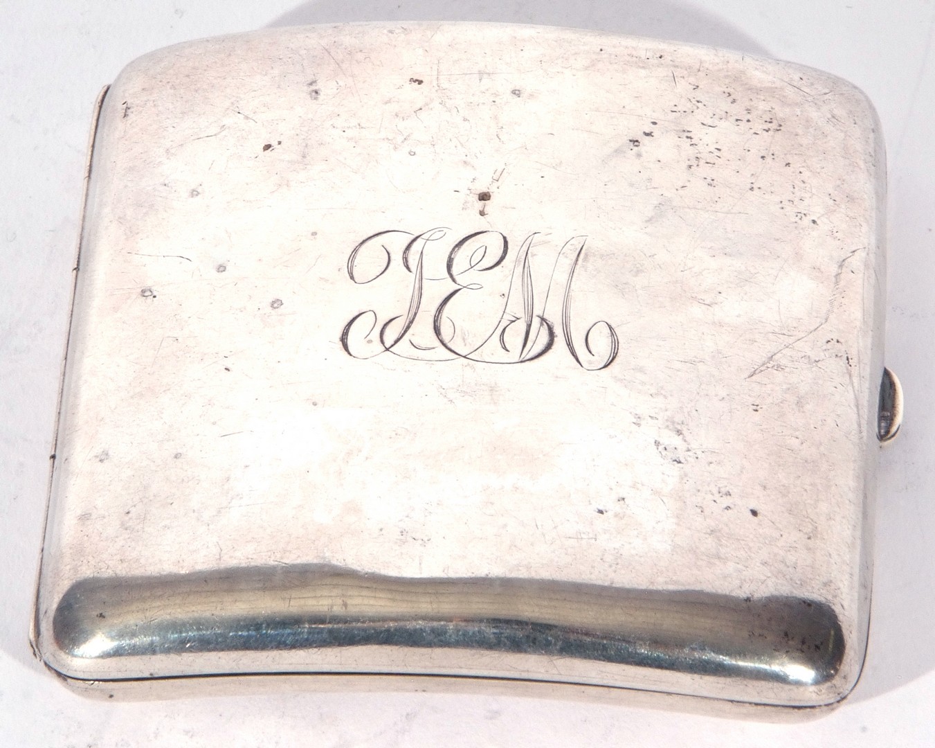 George V silver cigarette case of hinged and curved square form, Birmingham 1912, maker's mark A&J