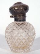 Edward VII cut clear glass and silver mounted dressing table bottle, London 1909, 10cm tall
